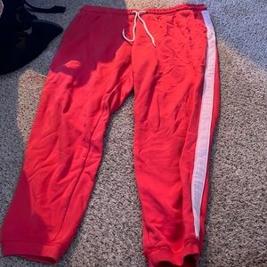 pinkish orangish sweatpants not that thick but are really comfortable